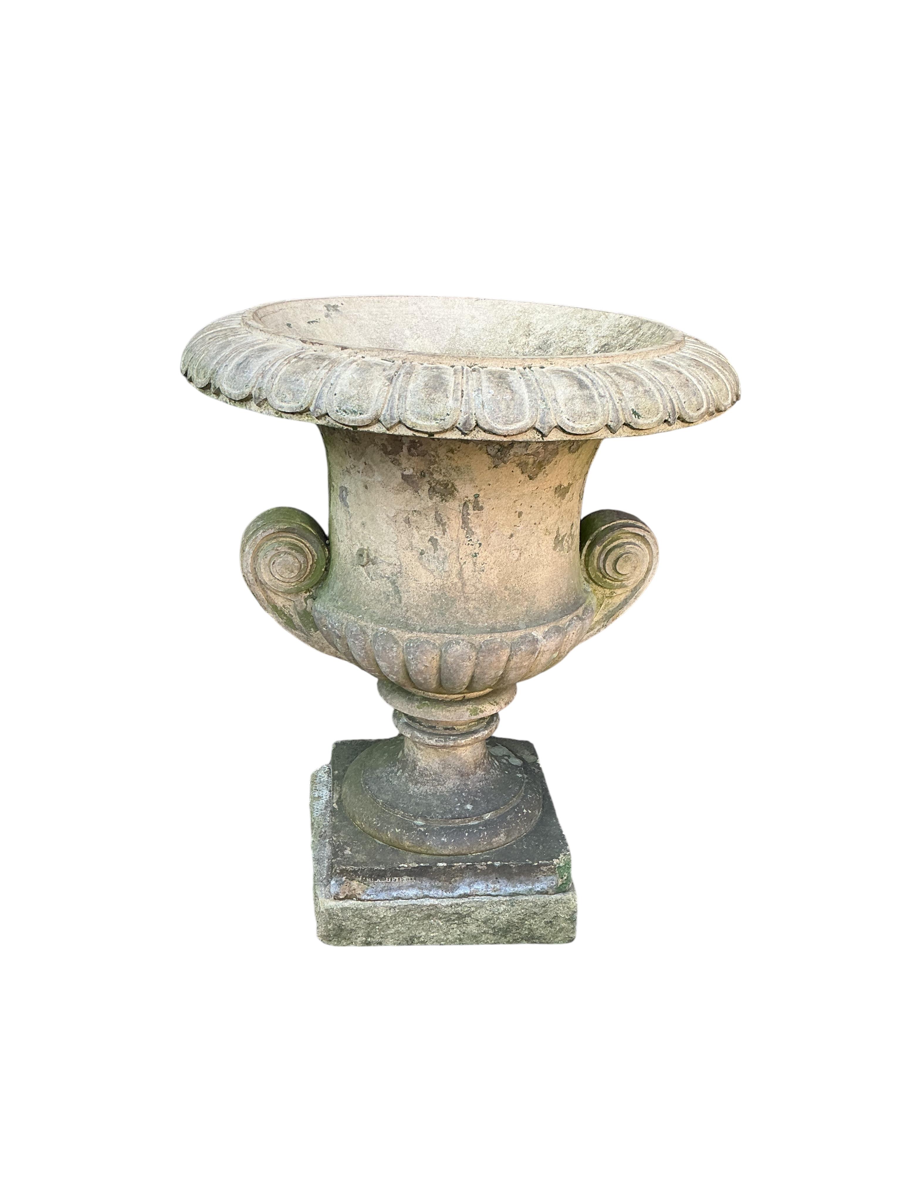 A Victorian Blashfield buff terracotta campana shaped garden urn, stamped ‘Blashfield, Stamford 1870’, diameter 46cm, height 56cm